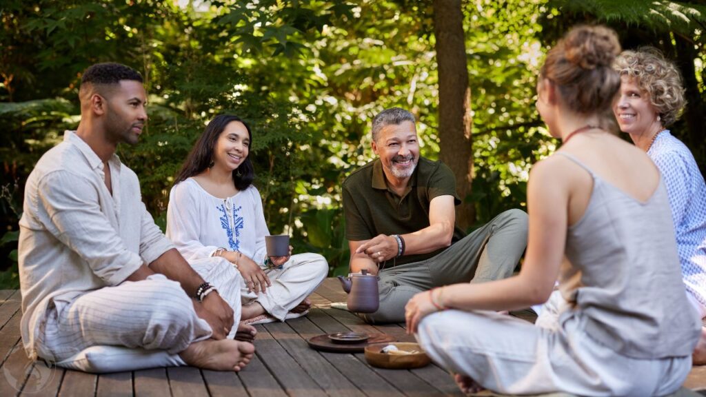 Healthy people group relaxing together during a detox retreat