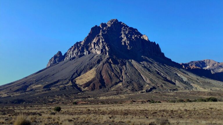Scenic Landscape of Mount Kenya Under Blue Sky